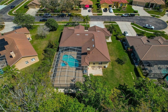 birds eye view of property with a residential view