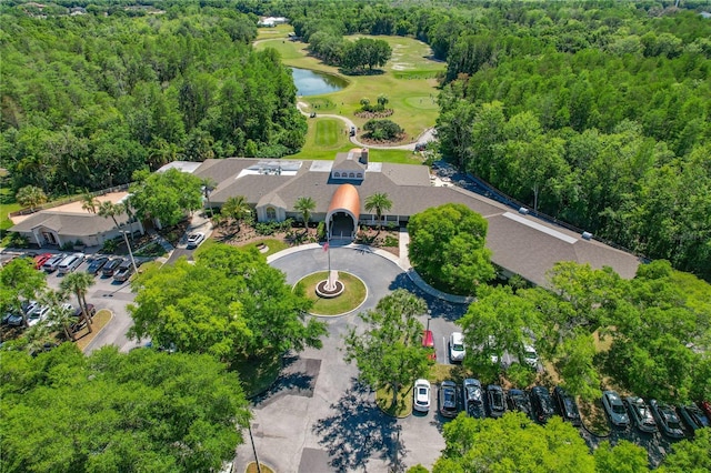 bird's eye view with a water view and view of golf course