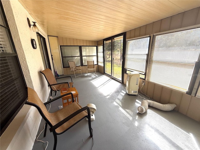 sunroom / solarium with wood ceiling