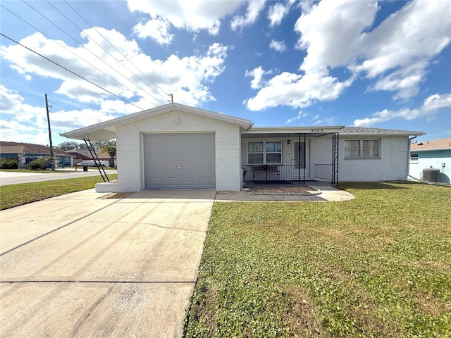 ranch-style home featuring covered porch, a garage, a front lawn, and central air condition unit