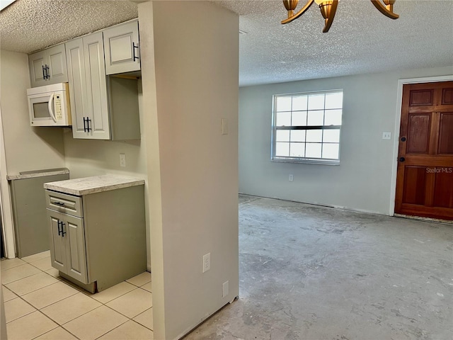 kitchen featuring a textured ceiling