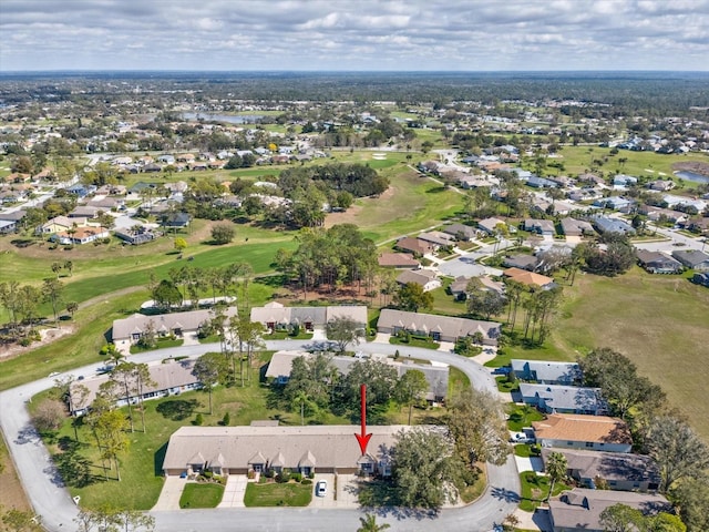 birds eye view of property with a residential view