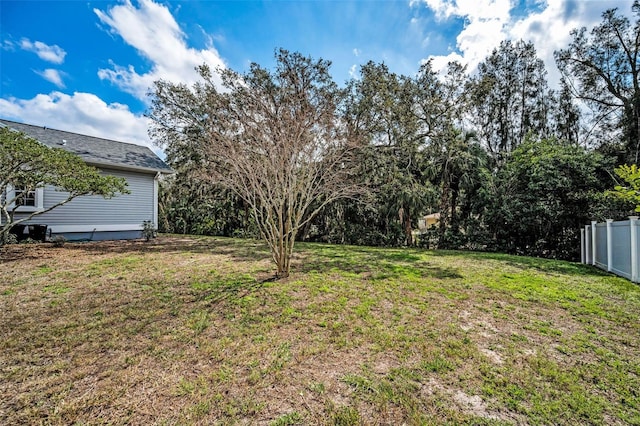 view of yard with fence