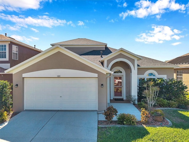 view of front of home featuring a garage