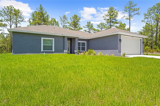 11345 Thrasher Ave, Weeki Wachee, FL 34614 - single story home with stucco siding, an attached garage, a front lawn, and concrete driveway