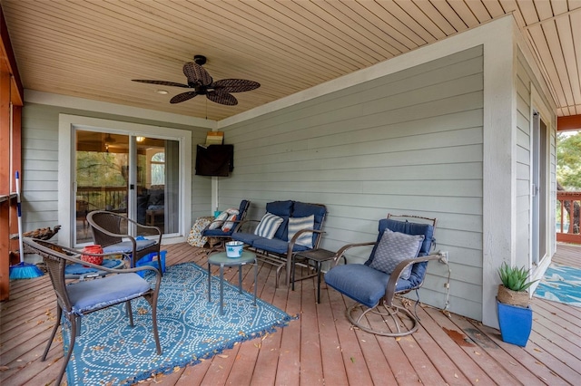 deck featuring a ceiling fan