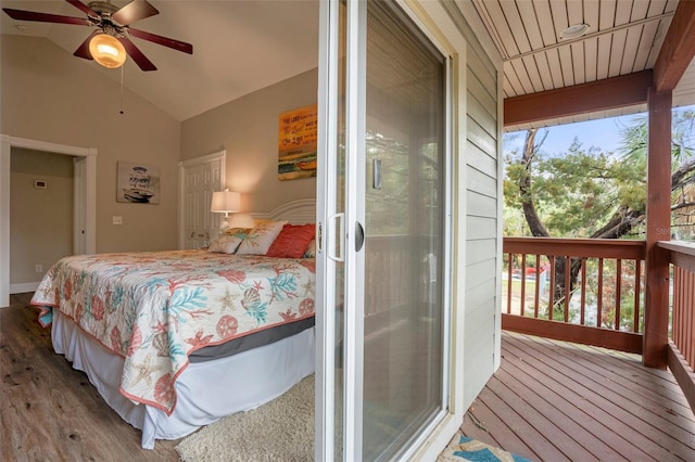 bedroom featuring ceiling fan, vaulted ceiling, and wood finished floors