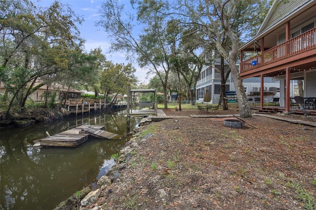 dock area with a water view