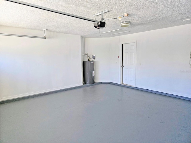 garage featuring a garage door opener and electric water heater