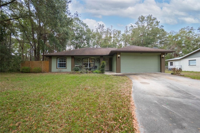 ranch-style house with a front yard and a garage