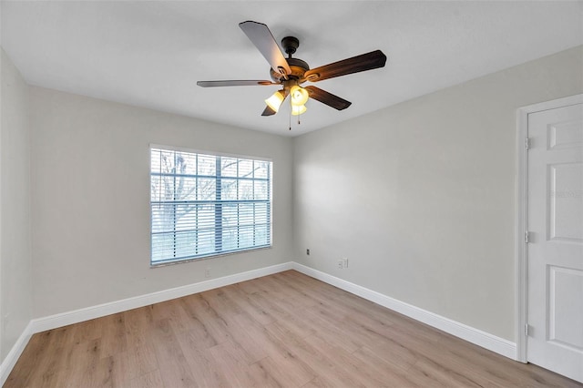 spare room with ceiling fan and light hardwood / wood-style floors