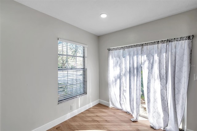 empty room featuring hardwood / wood-style flooring