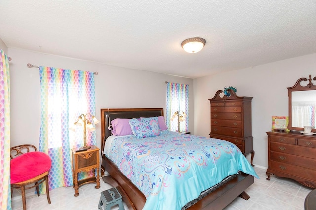 bedroom with a textured ceiling