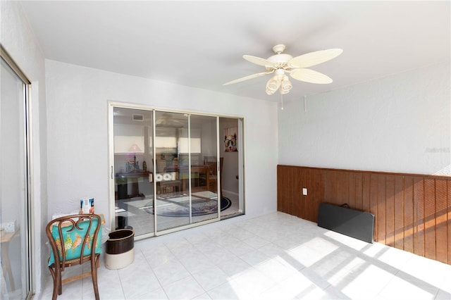 unfurnished room featuring ceiling fan