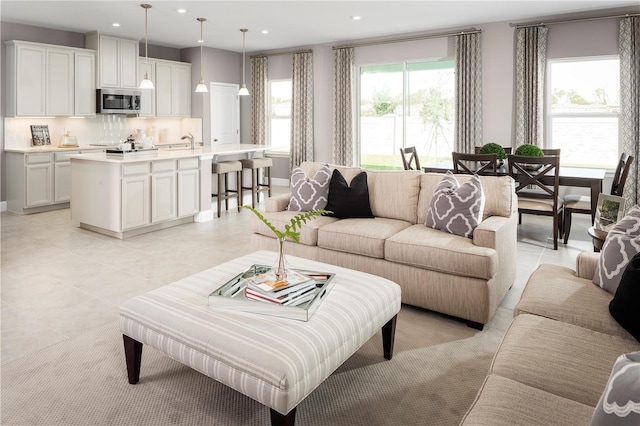 living room with light tile patterned floors