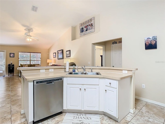 kitchen with white cabinets, lofted ceiling, stainless steel dishwasher, ceiling fan, and sink