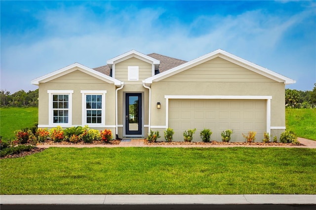 view of front facade featuring a garage and a front lawn