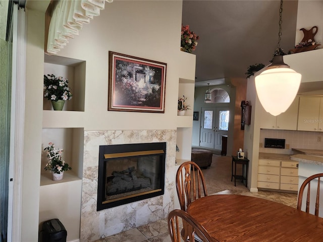 dining area with a premium fireplace