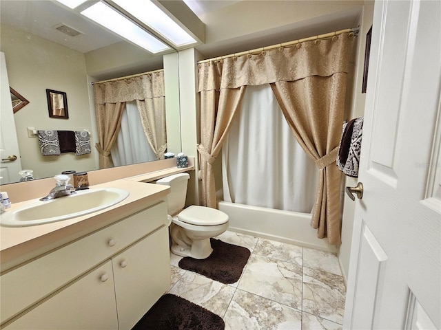 8157 Hidden Hills Dr, Spring Hill, FL 34606 - bathroom with toilet, marble finish floors, vanity, and shower / bath combo with shower curtain