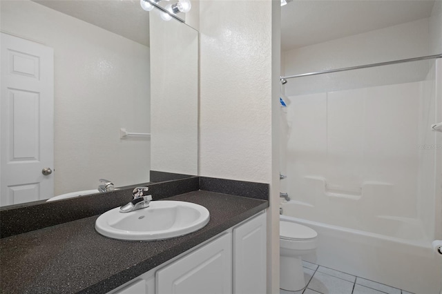 full bathroom featuring toilet, vanity, shower / bathing tub combination, and tile patterned floors