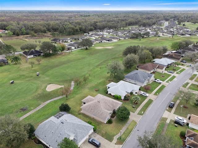 bird's eye view featuring golf course view and a residential view