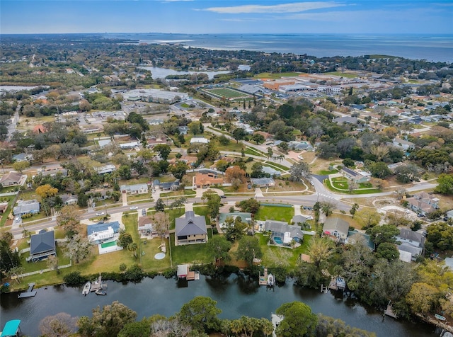 aerial view with a water view and a residential view