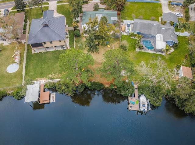 birds eye view of property featuring a water view