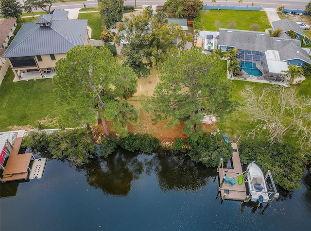 bird's eye view with a water view