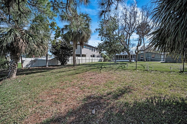 view of yard with fence