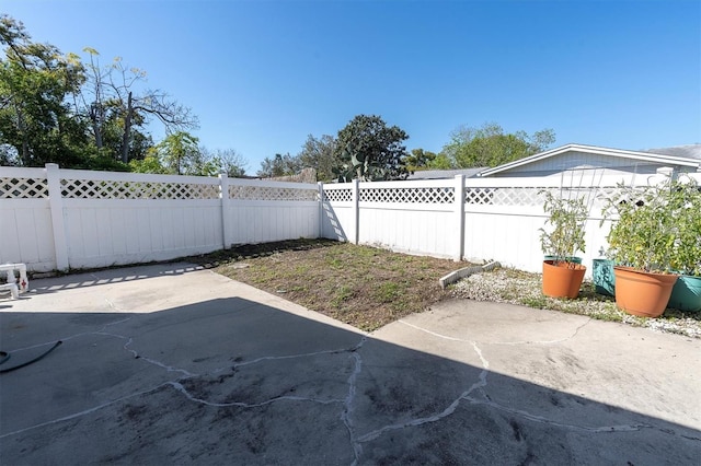 view of patio with a fenced backyard