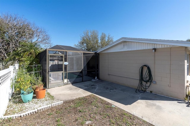 view of outdoor structure with fence