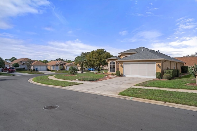 view of front facade featuring a front lawn, stucco siding, an attached garage, and concrete driveway