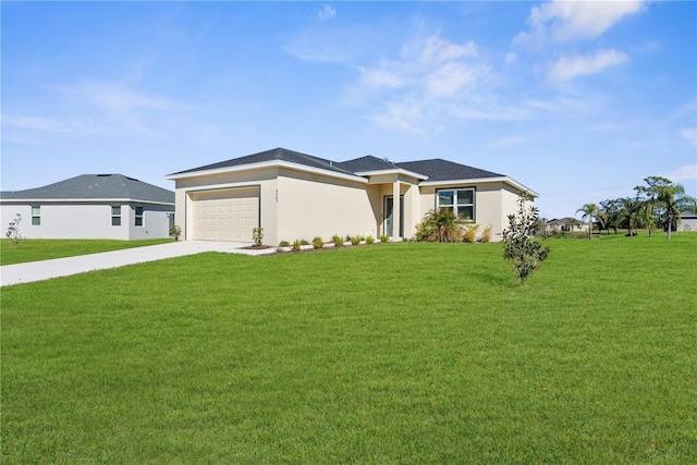 prairie-style home featuring driveway, a garage, a front lawn, and stucco siding