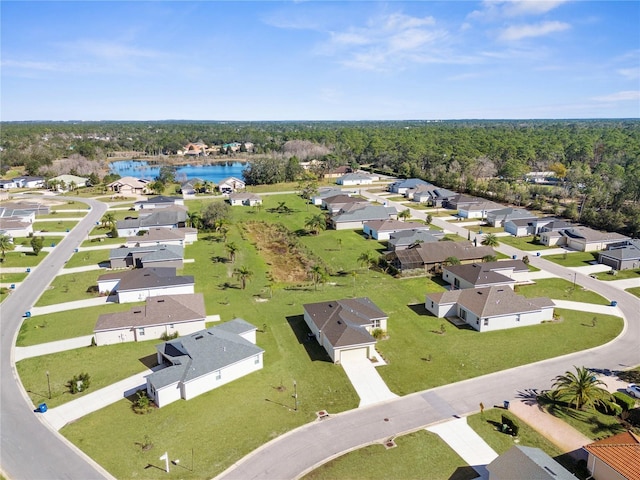 birds eye view of property featuring a water view and a residential view