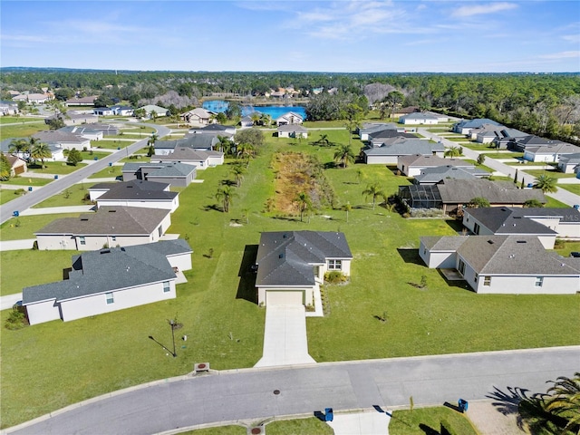 birds eye view of property with a residential view