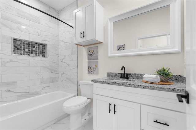 bathroom with marble finish floor, shower / washtub combination, vanity, and toilet