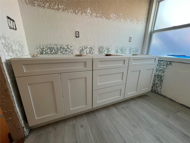 6228 Lonnie Lee Ln, Hudson, FL 34667 - bathroom with wood finished floors and dual sinks