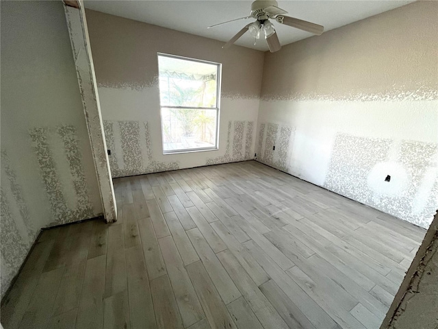 6228 Lonnie Lee Ln, Hudson, FL 34667 - spare room with wood finished floors and a ceiling fan