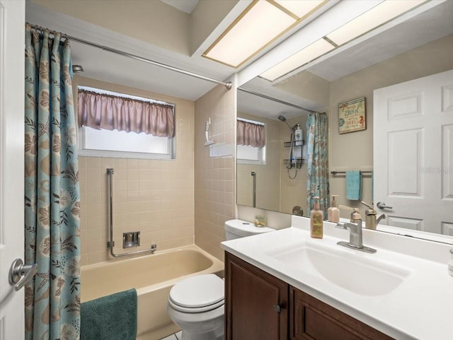 full bathroom with vanity, shower / bath combination with curtain, and toilet