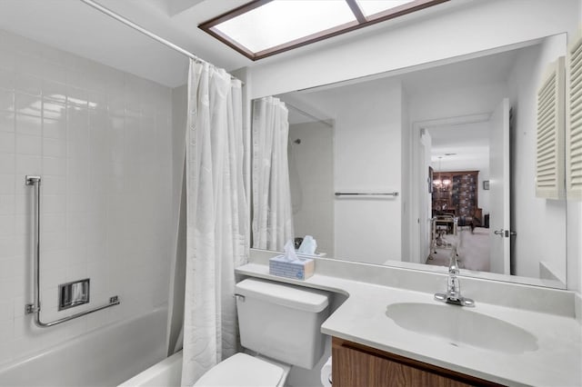 full bath featuring toilet, shower / bath combination with curtain, and vanity