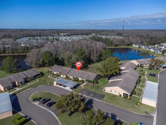 birds eye view of property featuring a residential view and a water view