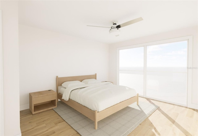 bedroom with light wood-style floors and ceiling fan