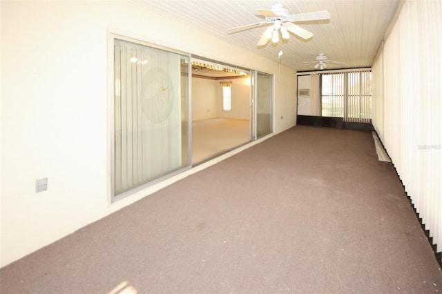 unfurnished room with a ceiling fan