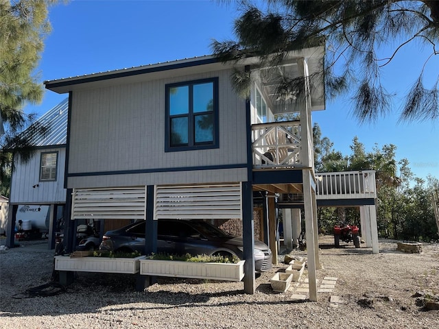 back of property with metal roof