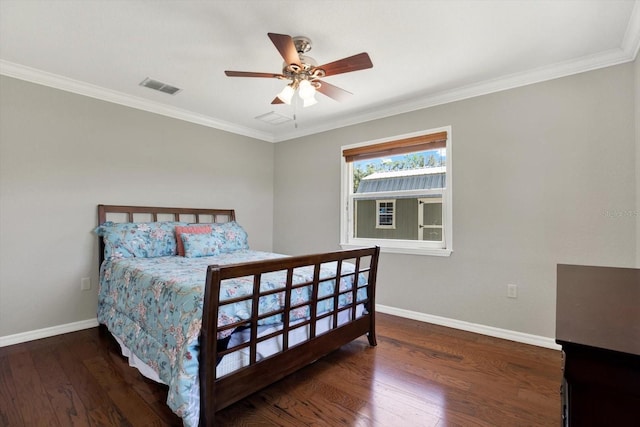 bedroom featuring visible vents, crown molding, baseboards, and wood-type flooring