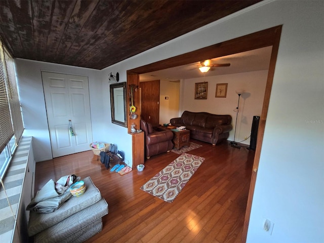 living room featuring wooden ceiling and wood finished floors