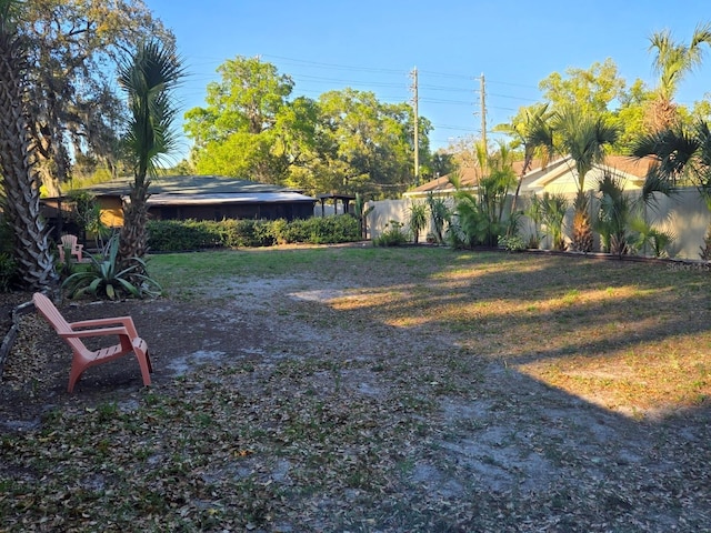 view of yard with fence