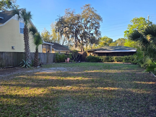 view of yard with fence