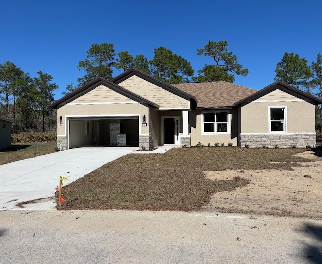 view of front of property featuring stone siding, an attached garage, driveway, and stucco siding