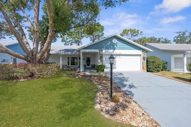 single story home with an attached garage, driveway, and a front yard